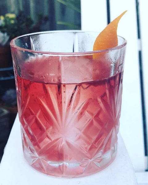 Cóctel de Roselle - An Agave forward sipper with a little smoke and a little sour.
